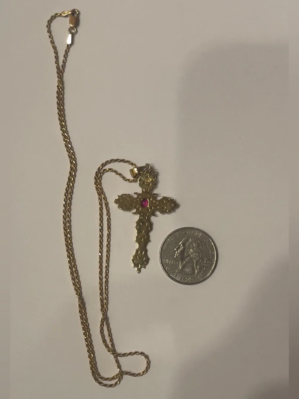 18 karat chain with a cross pendant